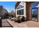 Spacious wooden deck with comfortable seating and lovely views of the property's surrounding landscape at 6406 Eagle Ct, Longmont, CO 80503