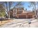 Gorgeous home with mature trees, a spacious driveway, and attached garage on a landscaped lot at 6406 Eagle Ct, Longmont, CO 80503