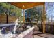 Inviting deck with a luxurious hot tub, perfect for relaxation and enjoying the surrounding landscape at 6406 Eagle Ct, Longmont, CO 80503
