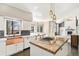 Well-appointed kitchen with granite counters, stainless steel appliances, and a cozy breakfast nook at 6406 Eagle Ct, Longmont, CO 80503