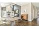 Inviting living room featuring a vaulted ceiling, fireplace, and stylish decor offers a warm ambiance at 6406 Eagle Ct, Longmont, CO 80503