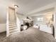 Inviting living room showcasing a brick fireplace, neutral decor, and comfortable seating, ideal for relaxation and gatherings at 11062 Hudson Ct, Thornton, CO 80233