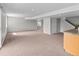 Finished basement includes bar area and access to stairs at 8414 Bed Straw St, Parker, CO 80134