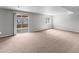 Spacious finished basement with sliding door to outside area at 8414 Bed Straw St, Parker, CO 80134