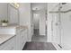 Ensuite bathroom featuring glass shower and tile floors at 8414 Bed Straw St, Parker, CO 80134