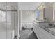 Beautiful bathroom with marble countertop, soaking tub, and glass shower at 8414 Bed Straw St, Parker, CO 80134