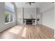 Bright living room with vaulted ceilings, a fireplace, and large windows for plenty of natural light at 8414 Bed Straw St, Parker, CO 80134