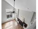 Bright living room boasts a modern fireplace, ceiling fan, and large windows for lots of natural light at 8414 Bed Straw St, Parker, CO 80134