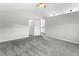 Spacious main bedroom featuring vaulted ceiling, plush carpet, and ensuite bathroom access at 8414 Bed Straw St, Parker, CO 80134