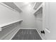 Walk-in closet with carpet and shelving at 8414 Bed Straw St, Parker, CO 80134