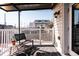 Comfortable back porch with modern chair and decorative rug for outdoor relaxation at 3746 Jason St, Denver, CO 80211