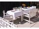 Backyard with a dining table set under the sun for outdoor dining at 3746 Jason St, Denver, CO 80211
