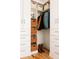 Custom closet with built-in storage, drawers, shelves, and hardwood floors at 3746 Jason St, Denver, CO 80211