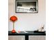 Living space featuring a modern black cabinet, lamp, and stylish decor at 3746 Jason St, Denver, CO 80211