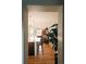 Open concept kitchen and living room featuring lots of natural light and hardwood floors at 3746 Jason St, Denver, CO 80211