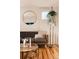 Comfortable living room with modern decor, hardwood floors, and ample natural light at 3746 Jason St, Denver, CO 80211