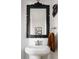 Close up of powder room featuring decorative mirror, towel and pedestal sink at 3746 Jason St, Denver, CO 80211