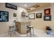 Basement bar area has bar stool seating and is great for entertaining at 3228 Country Club Pkwy, Castle Rock, CO 80108