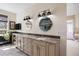 Bathroom features dual sinks, granite counters, updated fixtures, and an oversized mirror at 3228 Country Club Pkwy, Castle Rock, CO 80108