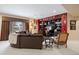 Open-concept living room features beautiful built-ins and comfortable seating at 3228 Country Club Pkwy, Castle Rock, CO 80108