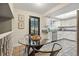 Charming eat-in kitchen featuring stainless steel appliances, skylight and modern cabinets at 3053 Mcintosh Dr, Longmont, CO 80503
