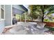 Charming back patio with an outdoor dining area, perfect for entertaining and relaxation at 10047 Sylvestor Rd, Highlands Ranch, CO 80129