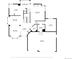 Detailed floor plan showcasing the layout of the home, including the living room, kitchen, and garage at 10047 Sylvestor Rd, Highlands Ranch, CO 80129