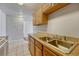 Spacious kitchen with a double sink and ample counter space at 8330 Zuni St # 219, Denver, CO 80221