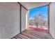 Outdoor patio featuring wooden deck and iron railing and view at 8330 Zuni St # 219, Denver, CO 80221