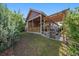 Well-maintained backyard with a covered patio, pergola, and lush greenery, ideal for outdoor entertaining and relaxation at 5437 S Granby Ct, Aurora, CO 80015