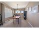 Bright home office with natural light from shuttered windows, neutral walls, and a simple desk setup at 5437 S Granby Ct, Aurora, CO 80015