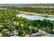 Panoramic aerial view of the area, showing the lake and surrounding cityscape at 4590 Grove St, Denver, CO 80211