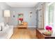 Inviting living room with hardwood floors, soft natural light, and tasteful decor at 4590 Grove St, Denver, CO 80211