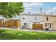 Backyard with a well-maintained lawn and wooden fence for privacy at 6722 S Independence St, Littleton, CO 80128