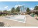 Community pool needing maintenance with tables, chairs, and mature trees at 6722 S Independence St, Littleton, CO 80128