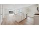 Spacious and bright kitchen with white cabinets, quartz countertops, and stainless steel appliances at 24780 E 39Th Ave, Aurora, CO 80019