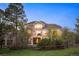 Exterior view of the house showing the deck, patio, and backyard at 7284 Timbercrest Ln, Castle Pines, CO 80108