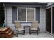 Relaxing patio featuring outdoor seating, a small table, and a patterned rug, great for outdoor leisure at 7988 S Johnson Ct, Littleton, CO 80128