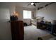 Cozy bedroom with a crib, colorful decor, and soft carpet, creating a comfortable and inviting space for a  at 7988 S Johnson Ct, Littleton, CO 80128