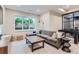 Relaxing basement lounge area with sectional sofa and large window at 1237 S Saint Paul St, Denver, CO 80210