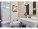 Clean bathroom with shower and single sink vanity at 1237 S Saint Paul St, Denver, CO 80210