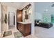 Spa-like bathroom featuring a walk-in shower and double vanity at 1237 S Saint Paul St, Denver, CO 80210