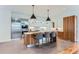 Modern kitchen with stainless steel appliances and wood cabinetry at 1237 S Saint Paul St, Denver, CO 80210