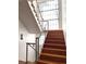 Modern staircase with glass and metal railings at 1237 S Saint Paul St, Denver, CO 80210