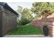Backyard featuring a retaining wall and a patch of green grass, great for relaxing in the outdoors at 12212 W 16Th Dr, Lakewood, CO 80215
