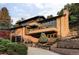 Stunning multi-story brick home with balconies and professionally landscaped front yard at 12212 W 16Th Dr, Lakewood, CO 80215