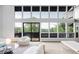 Bright and airy living room with large windows offering scenic views at 12212 W 16Th Dr, Lakewood, CO 80215