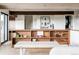 Stylish living room showcasing built-in shelving and modern accents at 12212 W 16Th Dr, Lakewood, CO 80215