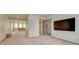 Spacious basement area featuring plush carpeting and an entertainment area with a large mounted television at 2880 Lake Meadow Dr, Monument, CO 80132