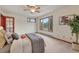 Cozy bedroom with a large window and natural light at 2880 Lake Meadow Dr, Monument, CO 80132